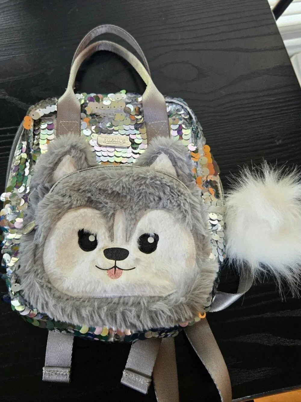 NWOT Justice girls' silver sequin and plush husky mini backpack w/ pompom